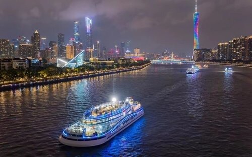Guangzhou Pearl River private night cruise - illuminated city skyline and bridges
